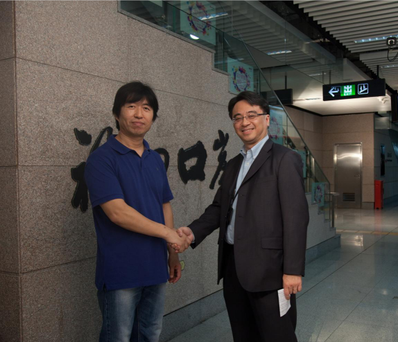 金泽培与沈总.png